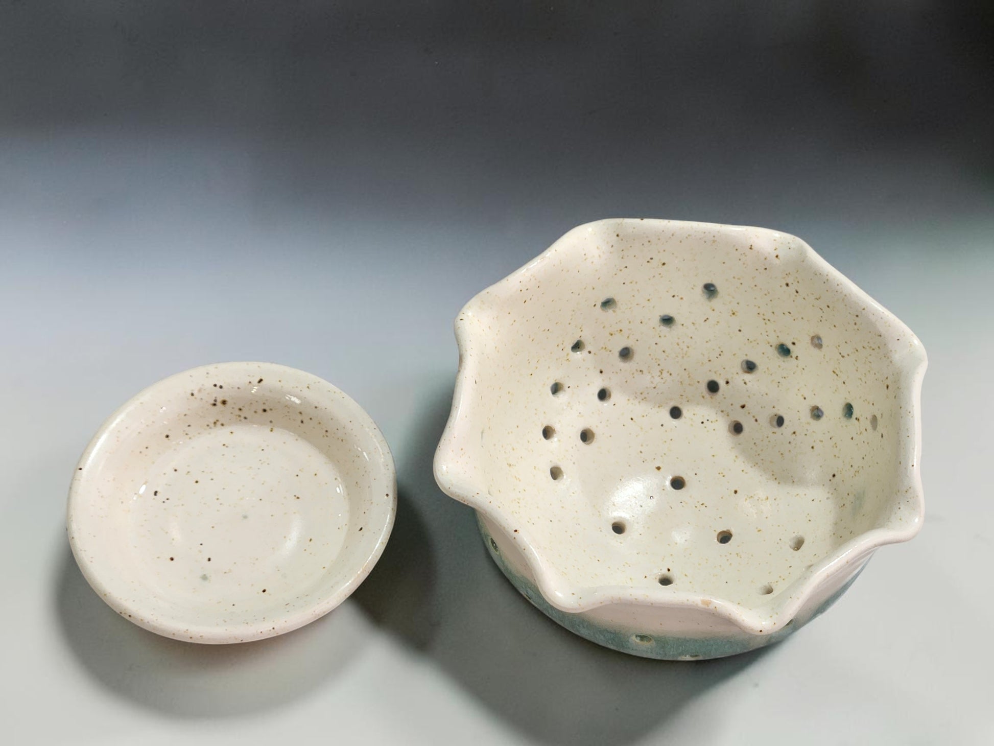 Strawberry bowl in speckled cream and spearmint green glaze
