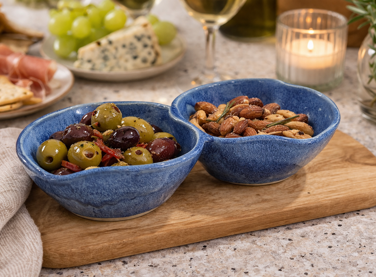 Handmade blue ceramic double snack bowl with two connected sections