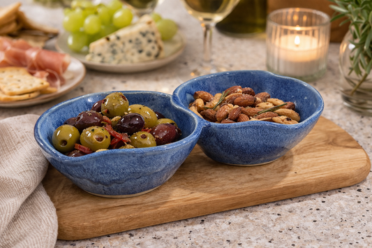 Handmade blue ceramic double snack bowl with two connected sections