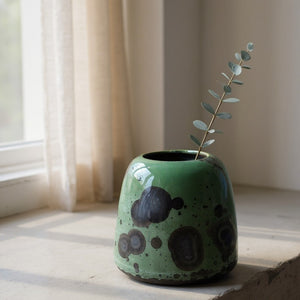 Handmade green crystalline pottery vase with metallic crystals