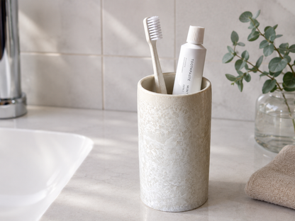 a small white crystalline toothbrush holder made in Melbourne