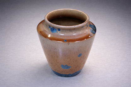 One-of-a-kind crystalline ceramic vase with glossy oatmeal interior and blue crystals