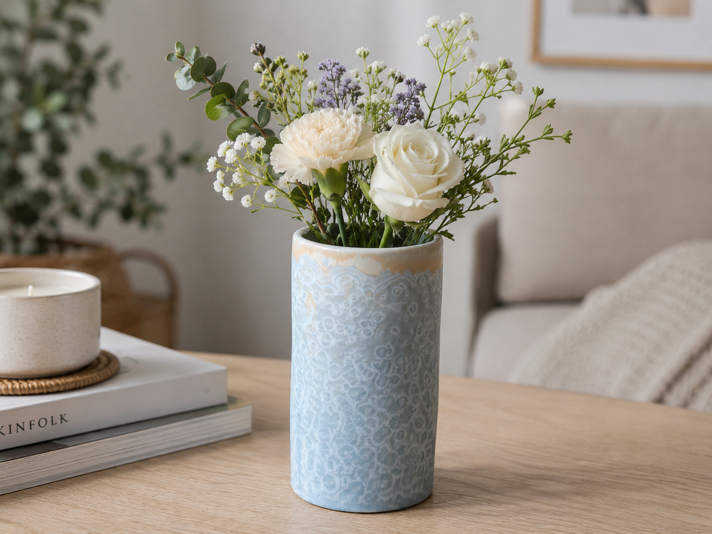 Small pale blue handmade ceramic crystalline vase