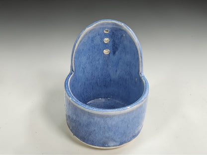 Blue glazed pottery herb stripper for fresh herbs