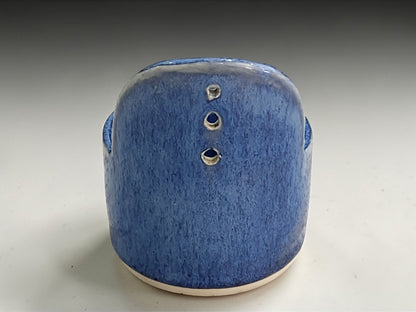 Unique blue ceramic herb stripper for stripping fresh herbs, back view.