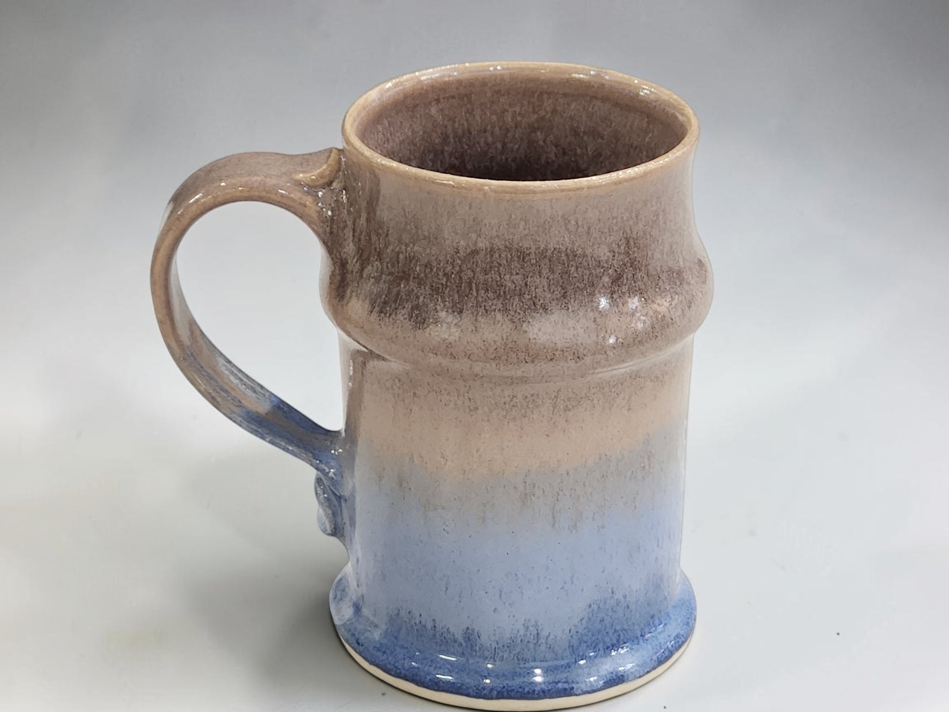 blue and oatmeal glaze on handmade stoneware stein