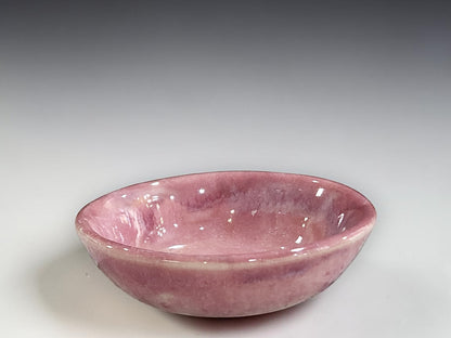 Handmade pottery ring dish in soft pink glaze