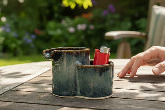 Handmade pottery ashtray with side lighter holder in Tenmoku glaze blushed with blue