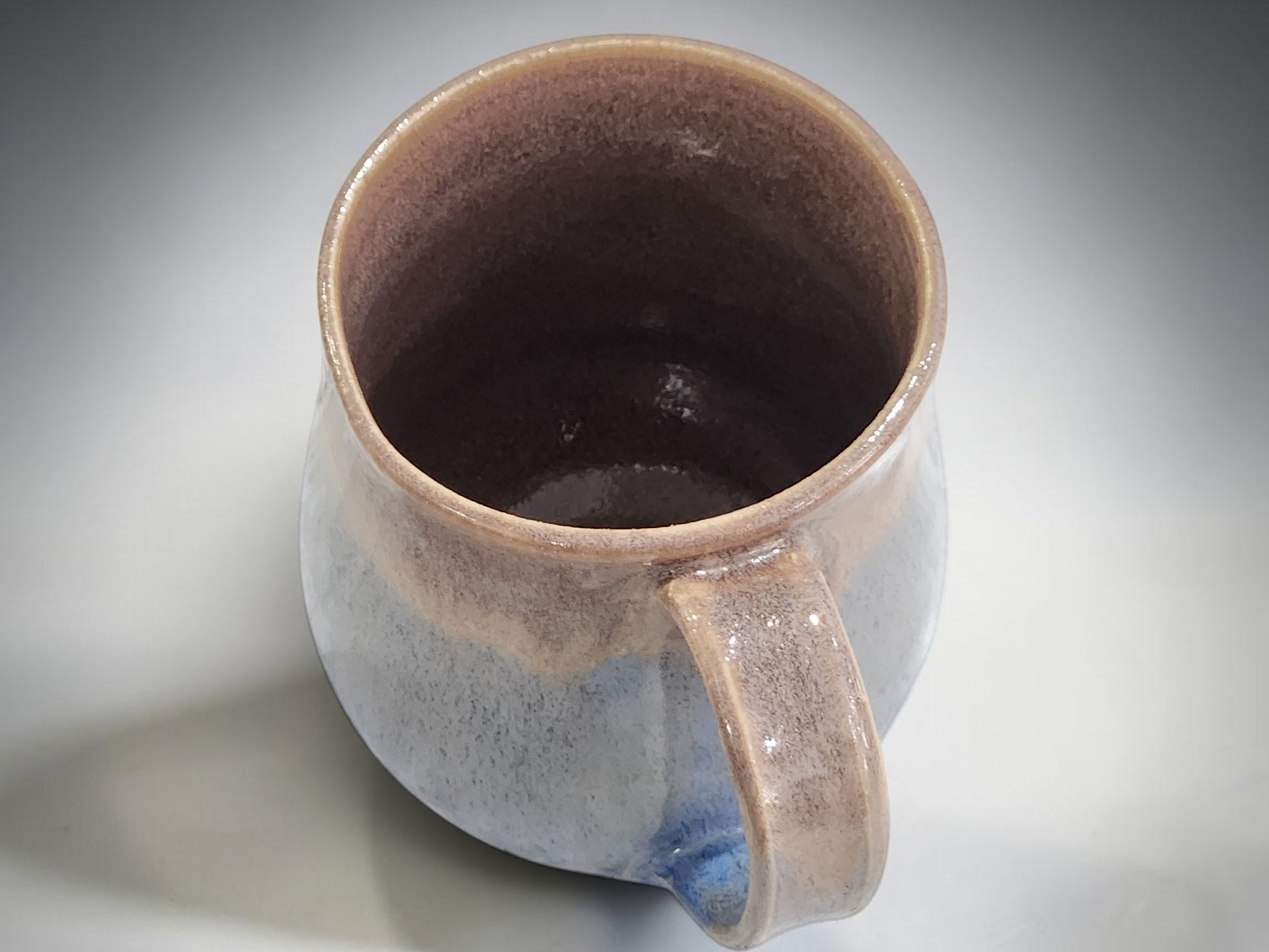 Wheel thrown pottery mug 300ml capacity blue and cream glaze finish