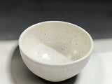 Contemporary handmade pottery bowl in speckled cream for everyday dining