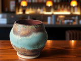 Handmade yunomi teacup with dripping glaze design