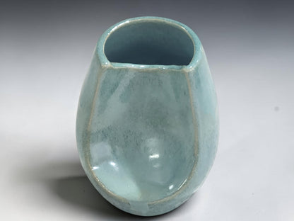 Contemporary handmade Australian pottery vase in seafoam glaze.