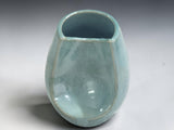 Contemporary handmade Australian pottery vase in seafoam glaze.