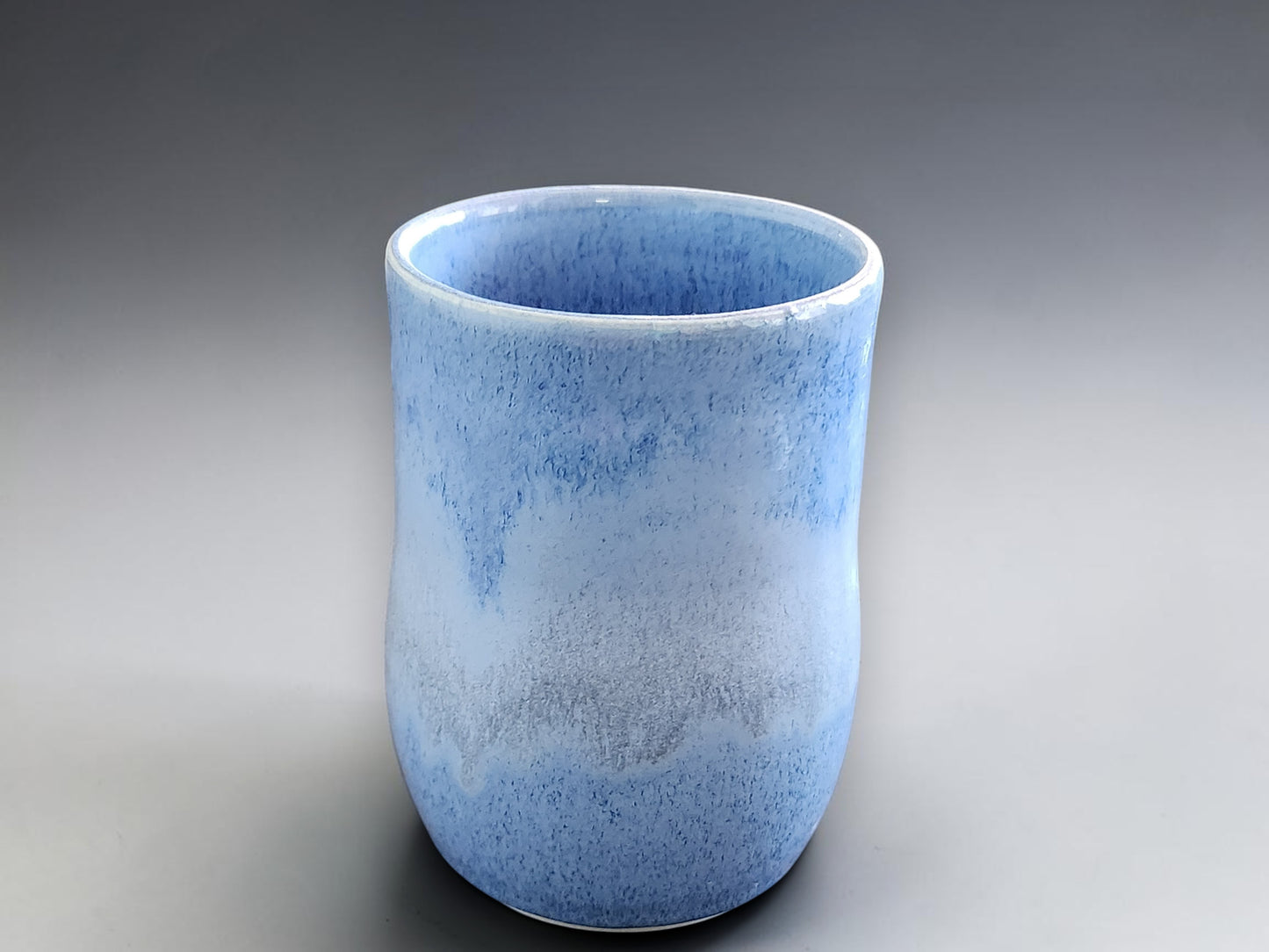 Artisan ceramic mug in glossy blue finish