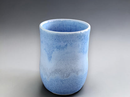 Artisan ceramic mug in glossy blue finish