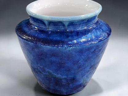 Handmade crystalline vase with rounded body and shaped shoulder