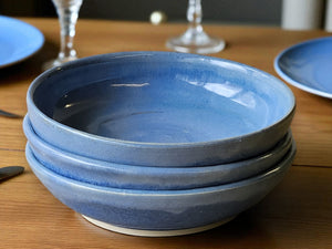 Handmade ceramic pasta bowl with blue glaze
