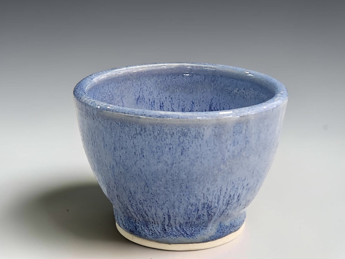 Handmade blue ceramic condiment bowl by Buxton Pottery with a glossy mottled glaze.