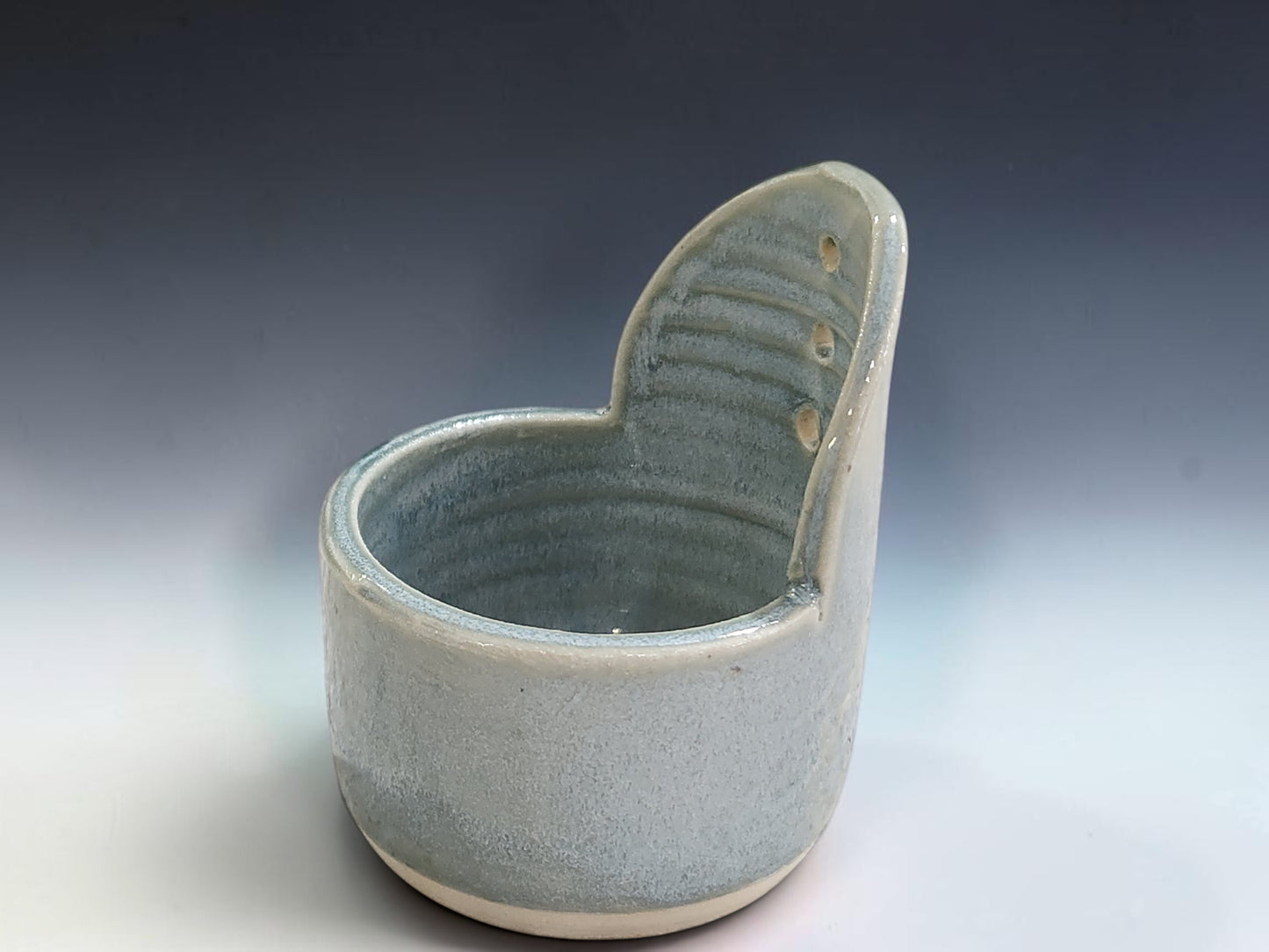 Soft blue-grey ceramic herb stripper, handmade kitchen tool by Buxton Pottery