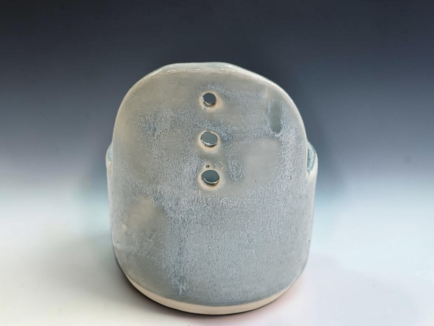 Handmade stoneware herb stripper with natural glaze variation and food-safe ceramic finish