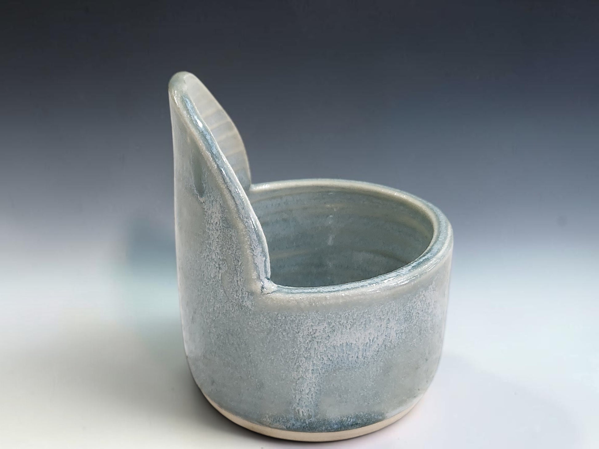 Australian handmade pottery herb tool for stripping leaves from fresh herbs in the kitchen