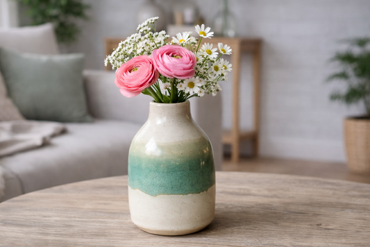 Handmade ceramic bottle bud vase 13cm with flowers on coffee table in lounge room, handmade pottery Melbourne Australia unique gift