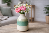 Handmade ceramic bottle bud vase 13cm with flowers on coffee table in lounge room, handmade pottery Melbourne Australia unique gift