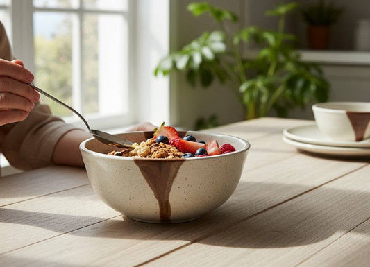 Handmade pottery cereal bowl with speckled cream glaze
