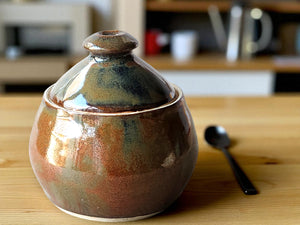 Bronze brown pottery sugar jar with metallic highlights