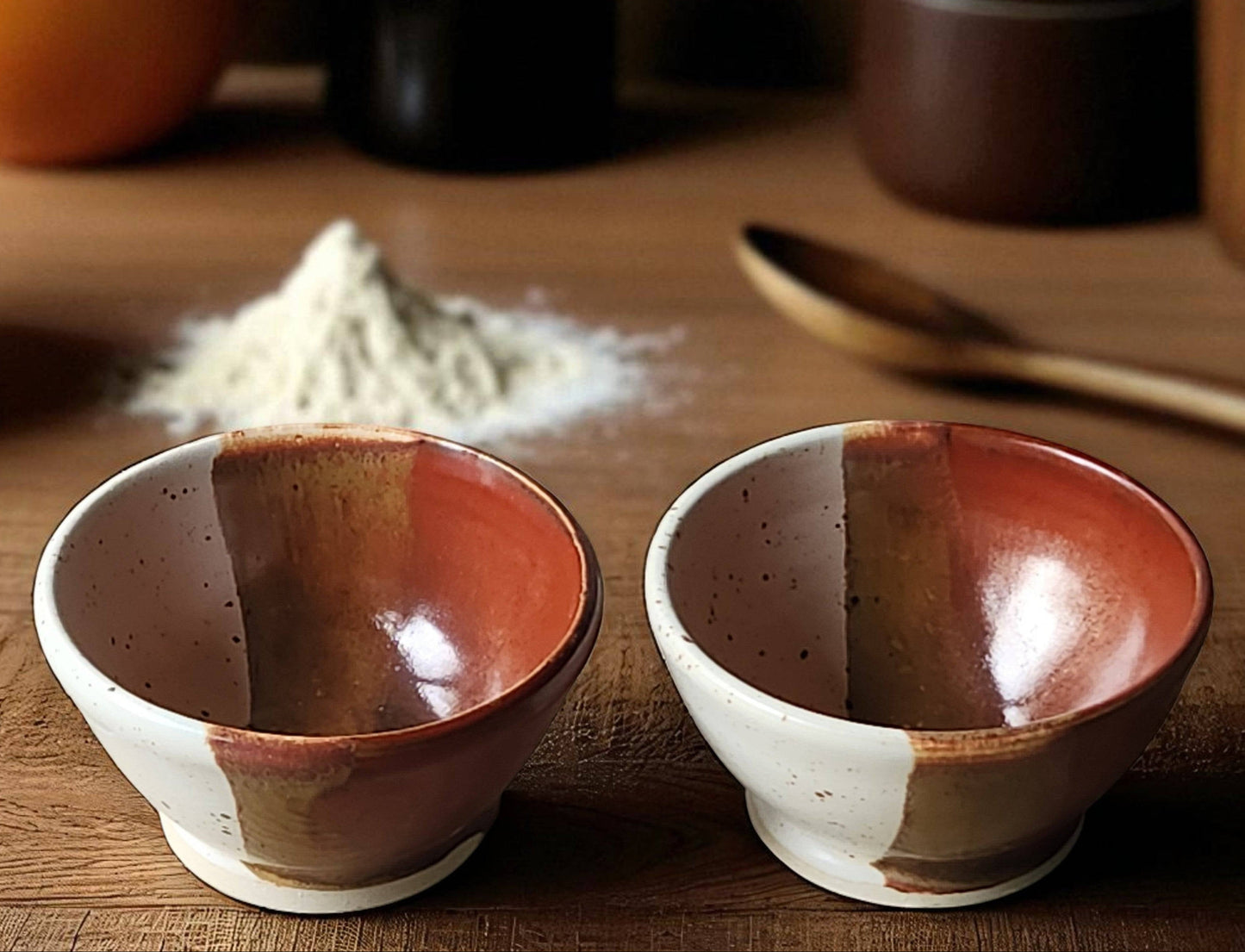 Handmade ceramic condiment bowl in cream and red-brown glaze
