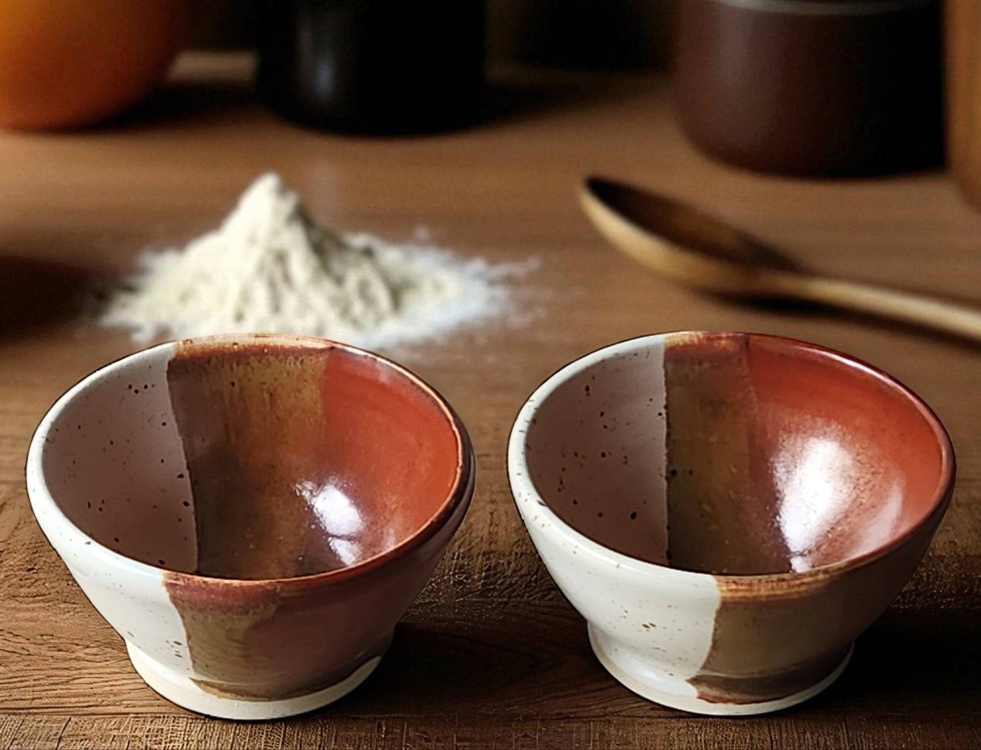 Handmade ceramic condiment bowl in cream and red-brown glaze