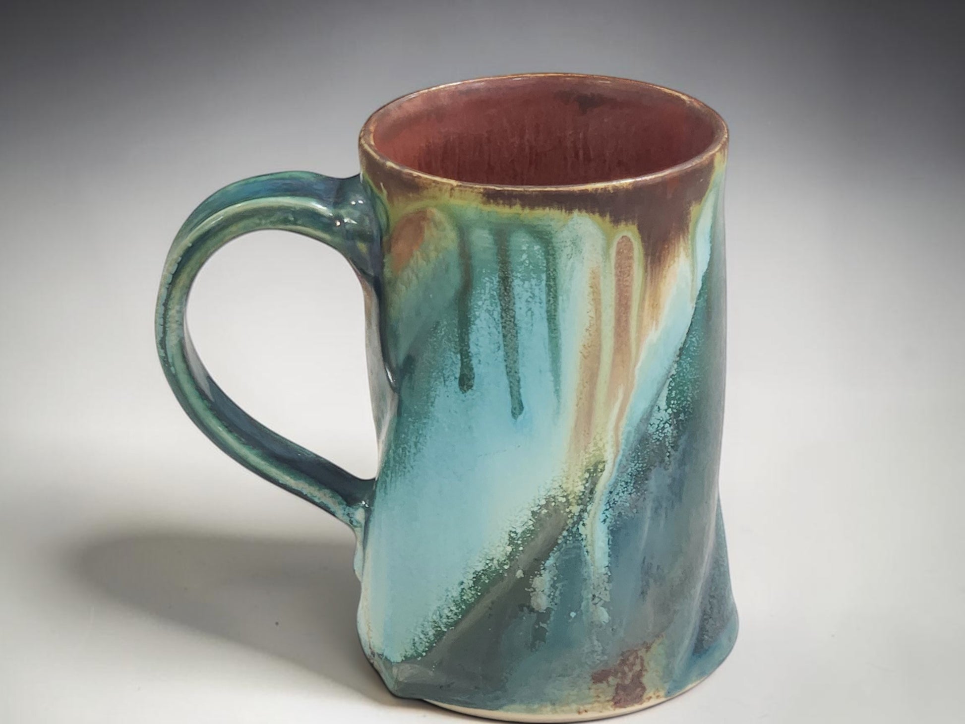 Handmade Australian pottery mug featuring unique Bush Creek Earth glaze and organic wheel-thrown design