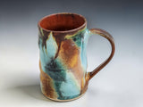 Bush Creek Collection handmade ceramic mug with rich terracotta interior and layered blue green glaze