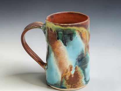 Australian handmade pottery mug with unique Bush Creek glaze variation and hand-pulled handle