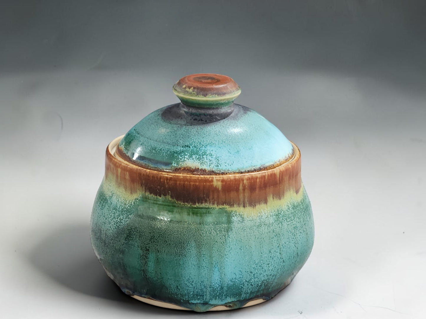 Handmade ceramic sugar bowl with lid in turquoise and earthy brown glaze