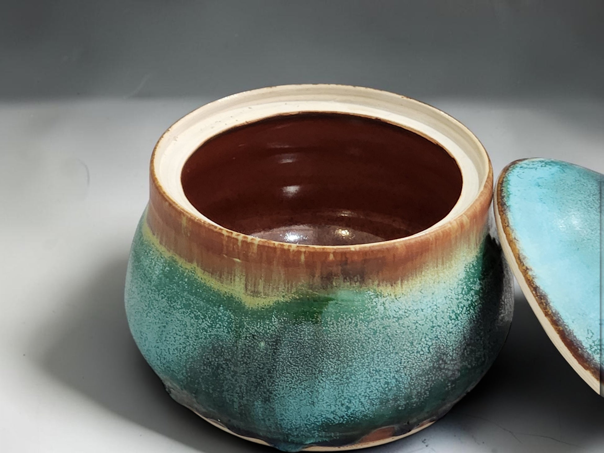 Wheel-thrown ceramic sugar bowl with turquoise green glaze