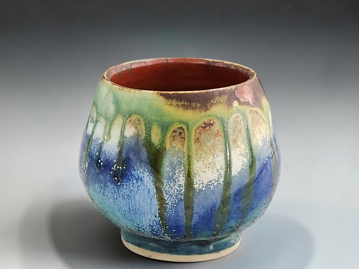 Rounded 250ml Japanese-style tea cup with rich multicoloured drip glaze