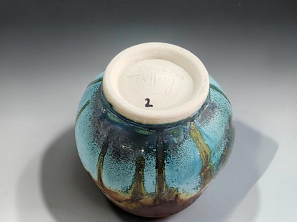 Teal ceramic whisky cup with unglazed clay foot ring