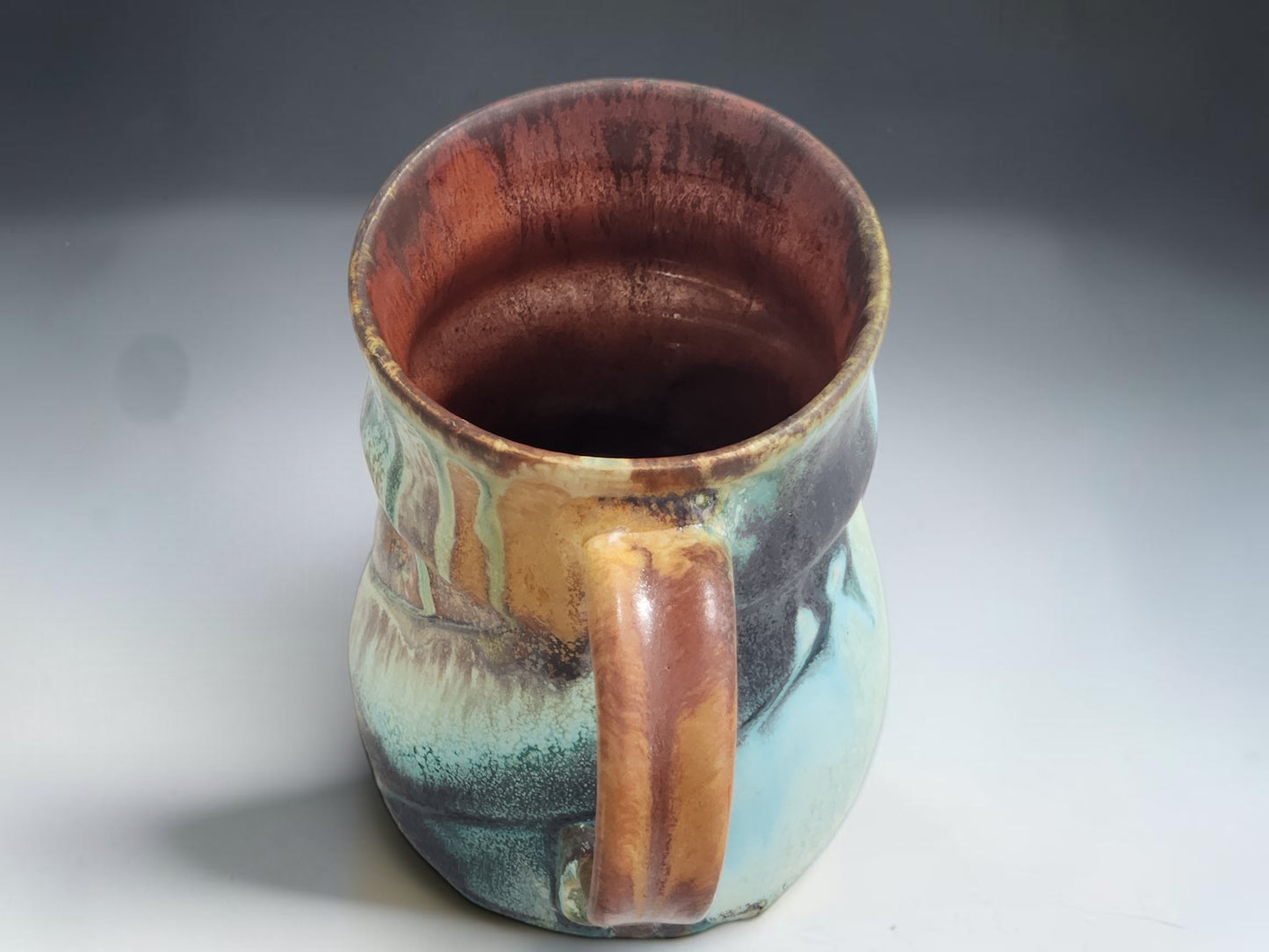 Artisan pottery mug with ash glaze finish and glossy interior handmade in Melbourne