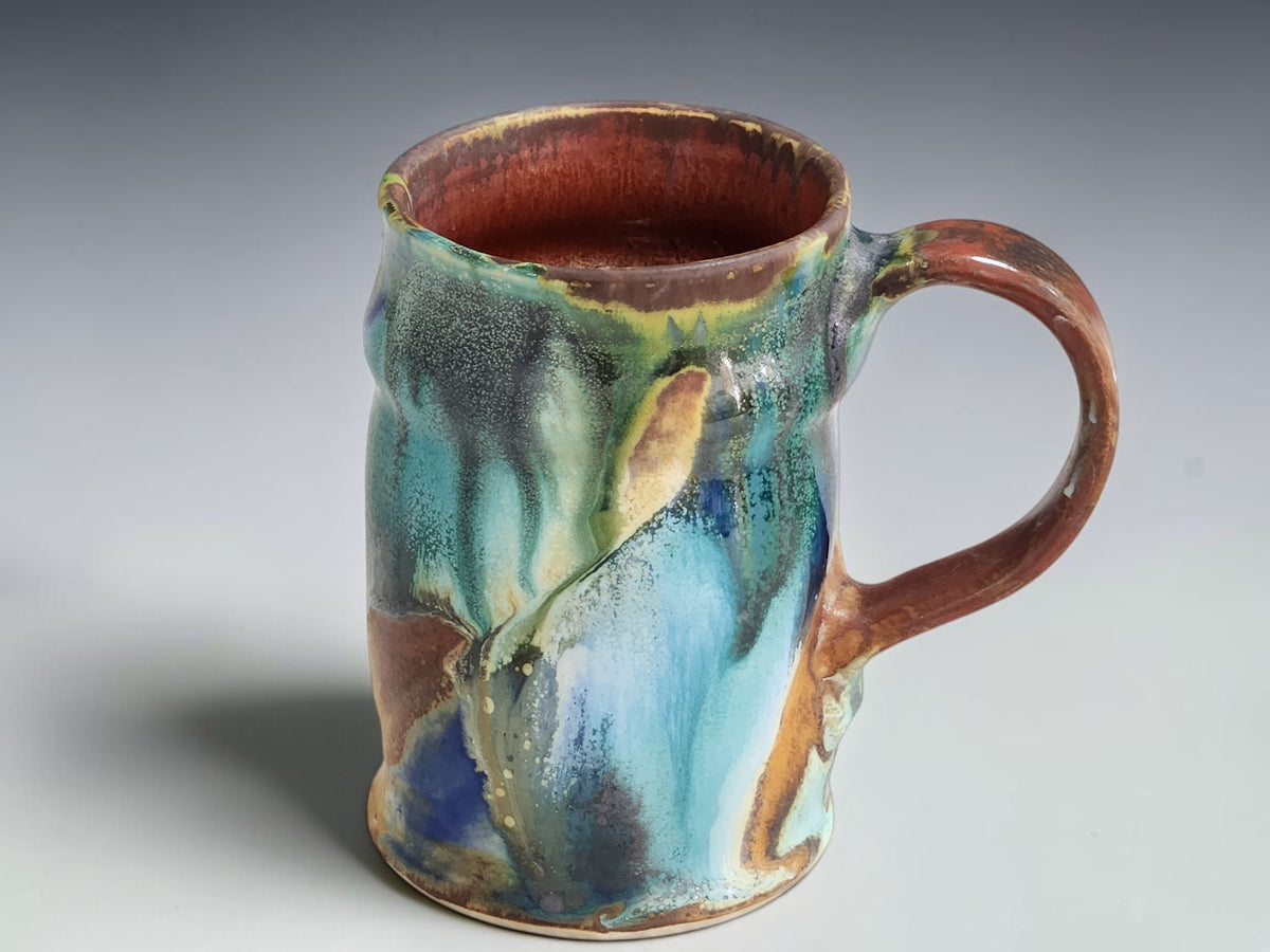 Bush Creek 350ml coffee mug with a rich brown glazed interior.