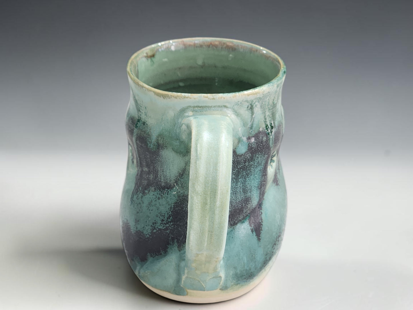 Large 450ml handmade stoneware mug with soft green glaze, ideal for coffee, tea or hot chocolate