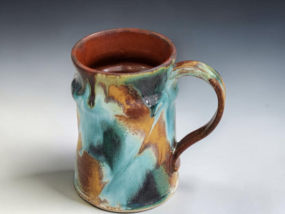 Bush Creek Collection handmade ceramic mug with terracotta interior and layered blue green glaze