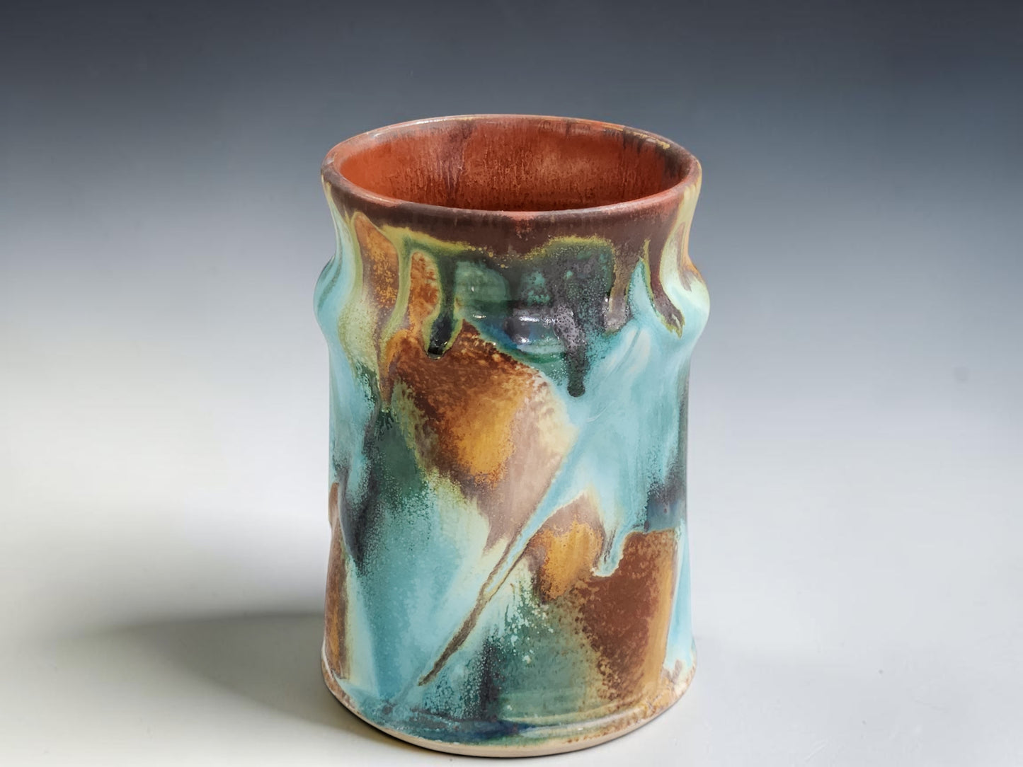 Australian handmade pottery mug with unique Bush Creek glaze variation and hand-pulled handle