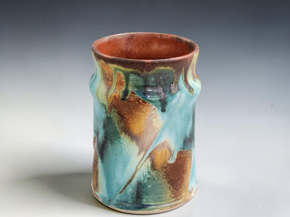 Australian handmade pottery mug with unique Bush Creek glaze variation and hand-pulled handle