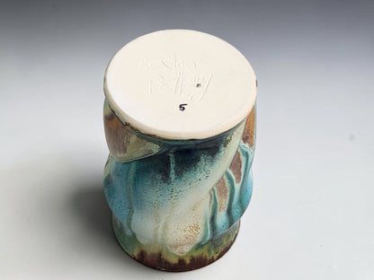 Bush Creek coffee mug showing its base and blue glaze detail near the base.