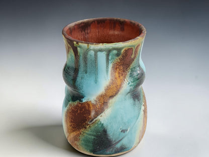 Bush Creek Collection handmade ceramic mug with warm terracotta interior and layered turquoise green exterior glaze