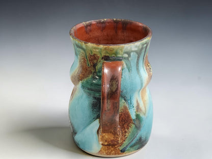 Australian handmade pottery mug with unique Bush Creek glaze variation and hand-pulled handle