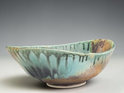 Handmade altered oval pottery bowl in Bush Creek glaze, crafted by Buxton Pottery in Melbourne Australia