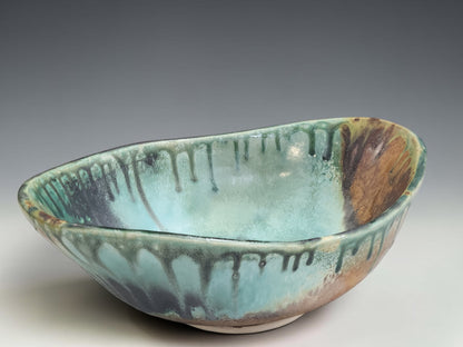 One-of-a-kind handmade ceramic centrepiece bowl with flowing turquoise and rust glaze