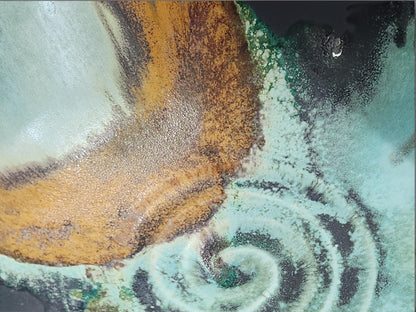 Close-up of Bush Creek glaze on handmade pottery bowl showing turquoise, rust, ochre and earthy glaze movement